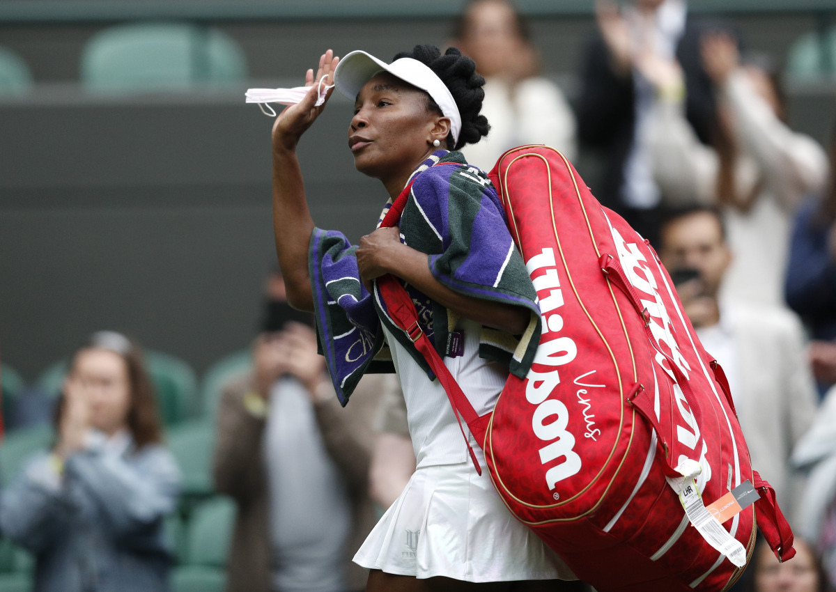 Tennis - Wimbledon - All England Lawn Tennis and Croquet Club, London, Britain - June 30, 2021 Venus Williams of the U.S. leaves court after losing her second round match against Tunisia's Ons Jabeur REUTERS/Peter Nicholls
