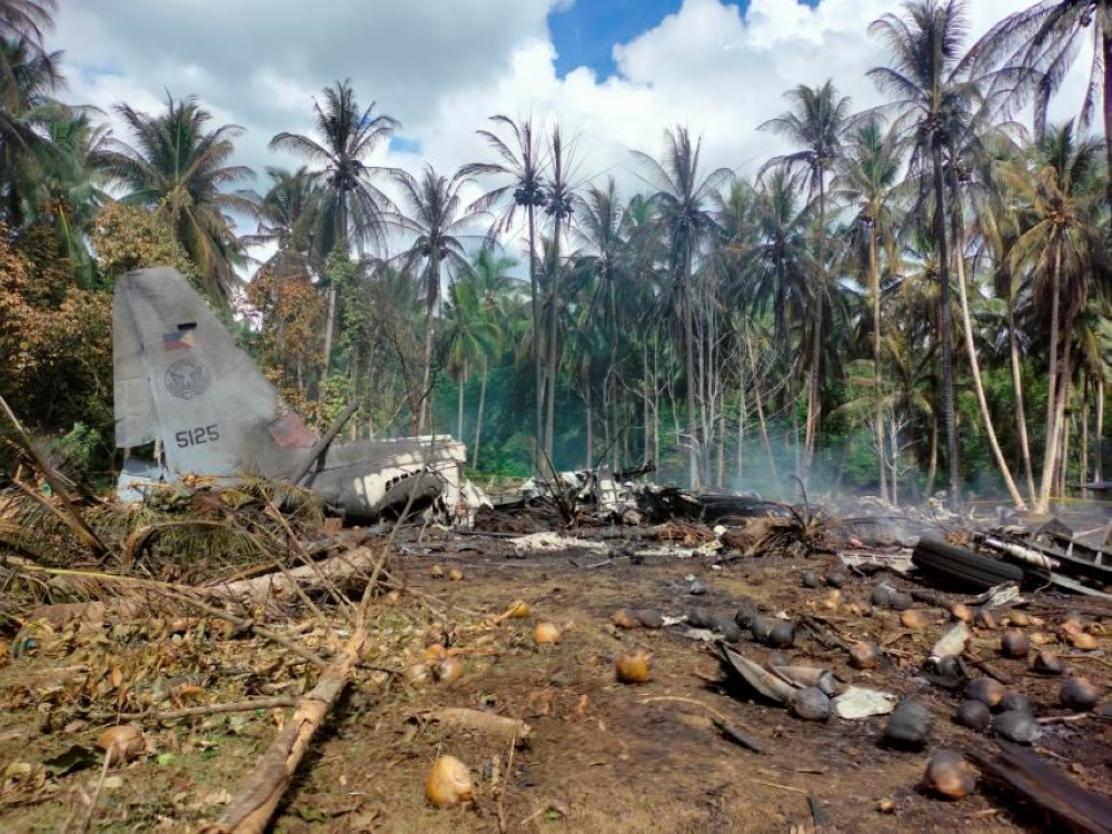View of the site after a Philippines Air Force Lockheed C-130 plane carrying troops crashed on landing in Patikul, Sulu province, Philippines July 4, 2021. Armed Forces of the Philippines - Joint Task Force Sulu
