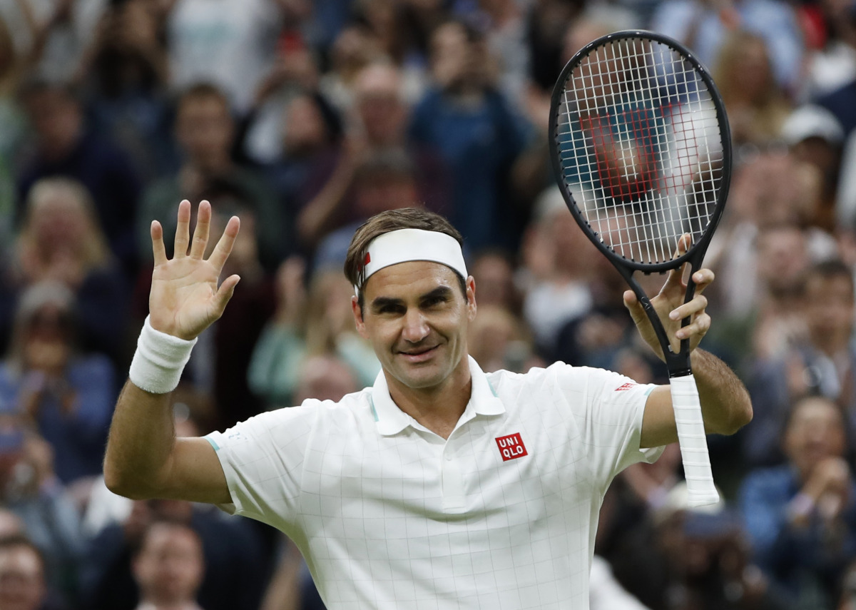 Tennis - Wimbledon - All England Lawn Tennis and Croquet Club, London, Britain - July 5, 2021 Switzerland's Roger federer celebrates winning his fourth round match against Italy's Lorenzo Sonego REUTERS/Paul Childs
