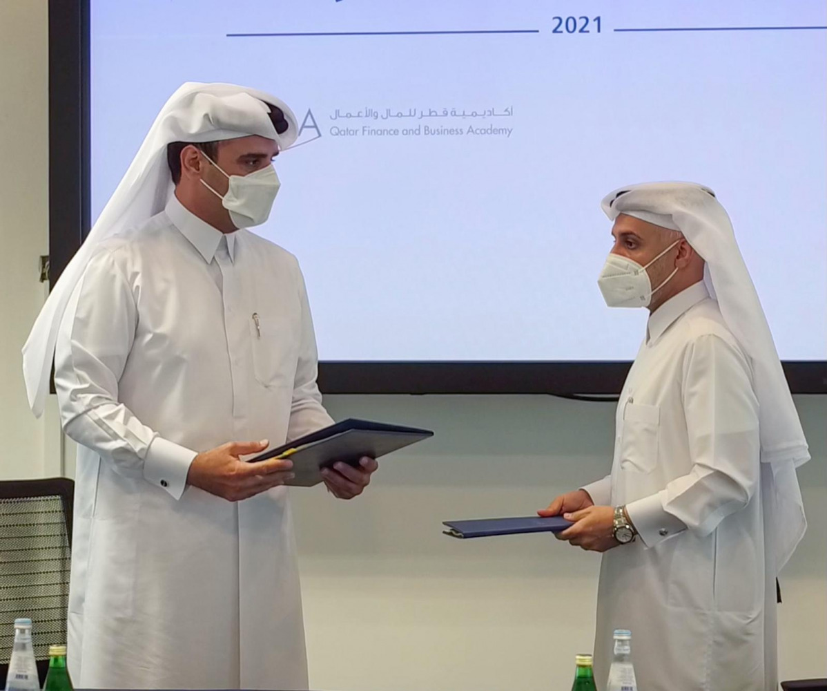 ACTA and QFBA officials during the signing of MoU.