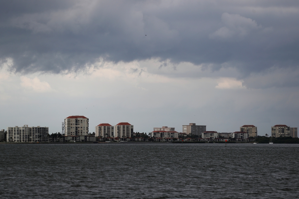 Dark clouds loom over the Pass-A-Grille channel ahead of Tropical Storm Elsa in St. Petersburg, Florida, U.S., July 5, 2021. REUTERS/Octavio Jones
