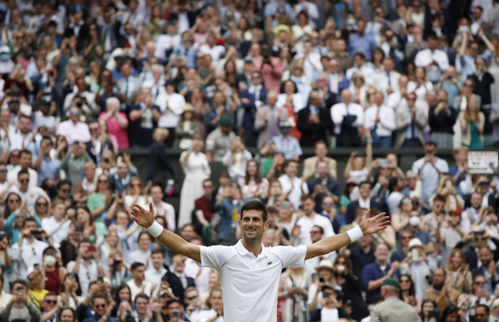 July 11, 2021 Serbia's Novak Djokovic celebrates winning his final match against Italy's Matteo Berrettini REUTERS/Paul Childs