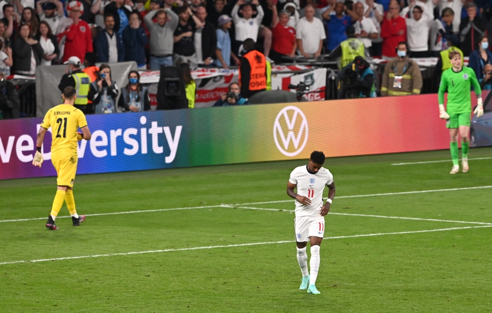 England's Marcus Rashford looks dejected after he misses a penalty during the shoot-out Pool via REUTERS/Facundo Arrizabalaga