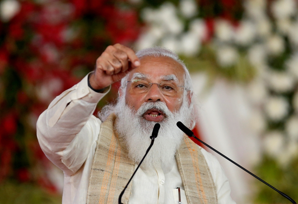 FILE PHOTO: India's Prime Minister Narendra Modi addresses a gathering before flagging off the 
