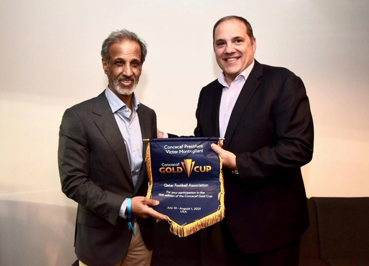 Victor Montagliani, President of Concacaf, presenting a
memento to Sheikh Hamad bin Khalifa bin Ahmed Al Thani,
President of the Qatar Football Association during a meeting
held on the sidelines of the Gold Cup in Houston, Texas, USA.