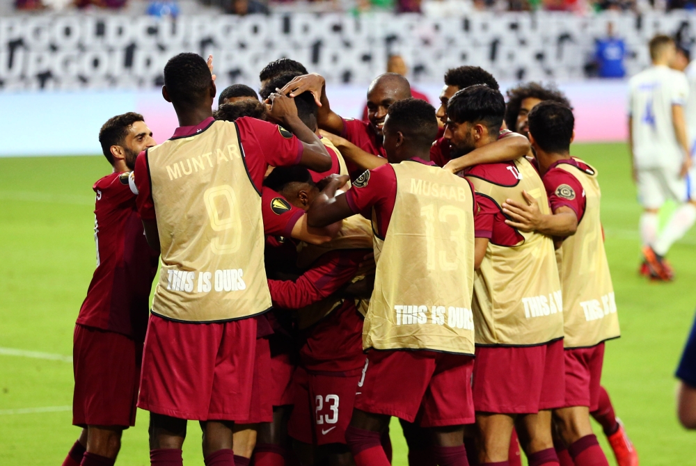 Qatar celebrates a goal against El Salvador in the second half during a CONCACAF Gold Cup quarterfinal soccer match at State Farm Stadium. Mandatory Credit: Billy Hardiman-USA TODAY Sports