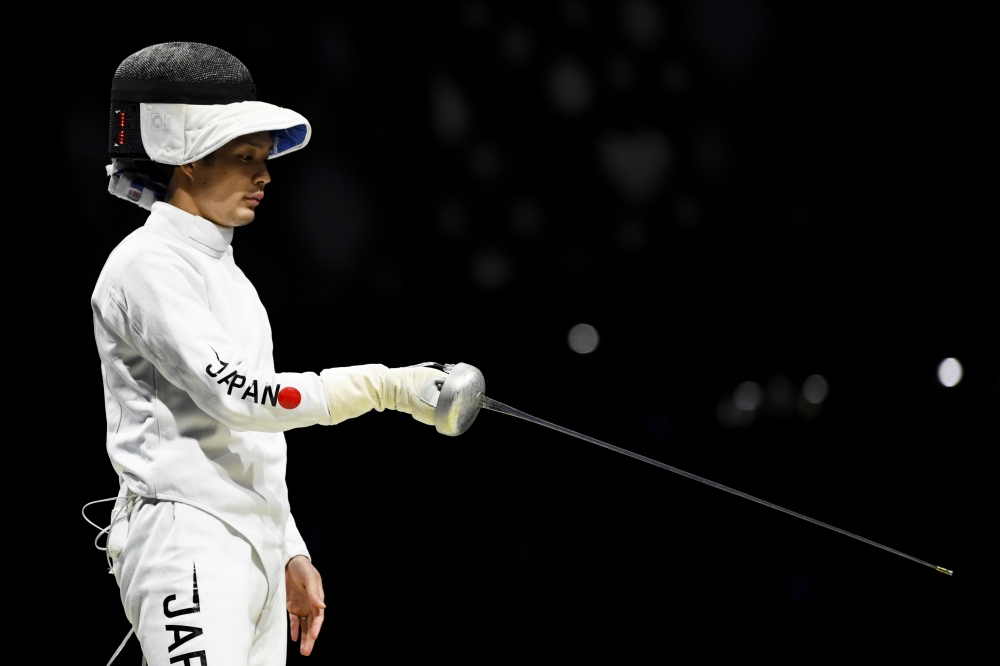 July 25, 2021 Masaru Yamada of Japan reacts REUTERS/Annegret Hilse