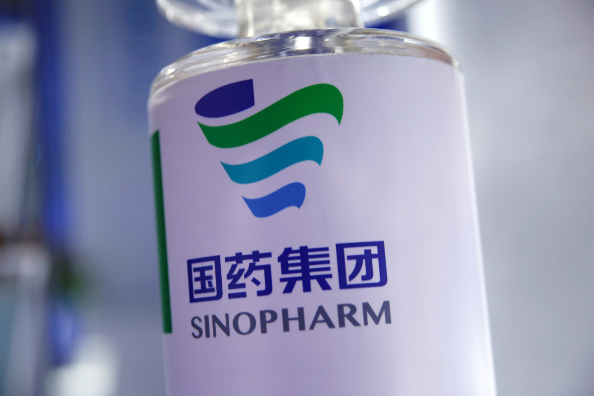 FILE PHOTO: Signage of Sinopharm is seen at the 2020 China International Fair for Trade in Services (CIFTIS), following the COVID-19 outbreak, in Beijing, China September 5, 2020. REUTERS/Tingshu Wang/File Photo
