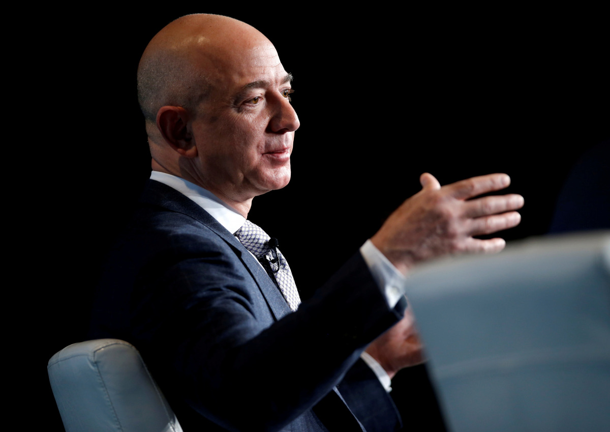 FILE PHOTO: Jeff Bezos, founder of Blue Origin and CEO of Amazon, speaks about the future plans of Blue Origin during an address to attendees at Access Intelligence's SATELLITE 2017 conference in Washington, U.S., March 7, 2017. REUTERS/Joshua Roberts/Fil