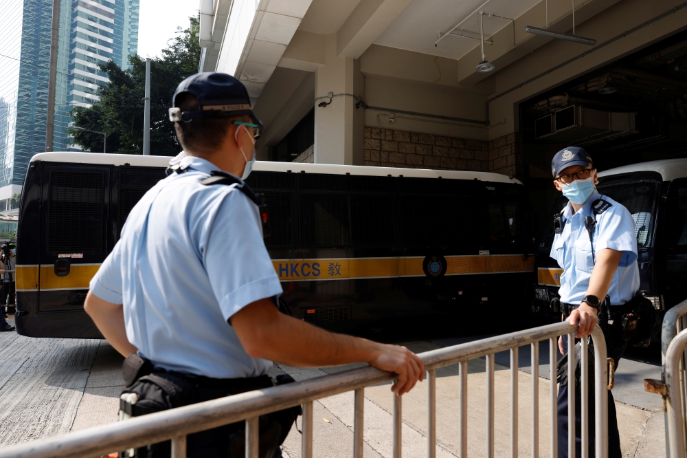 A prison van carrying Tong Ying-kit, the first person charged under the new national security law, arrives at High Court for a hearing, in Hong Kong, China, July 27, 2021. Reuters/Tyrone Siu