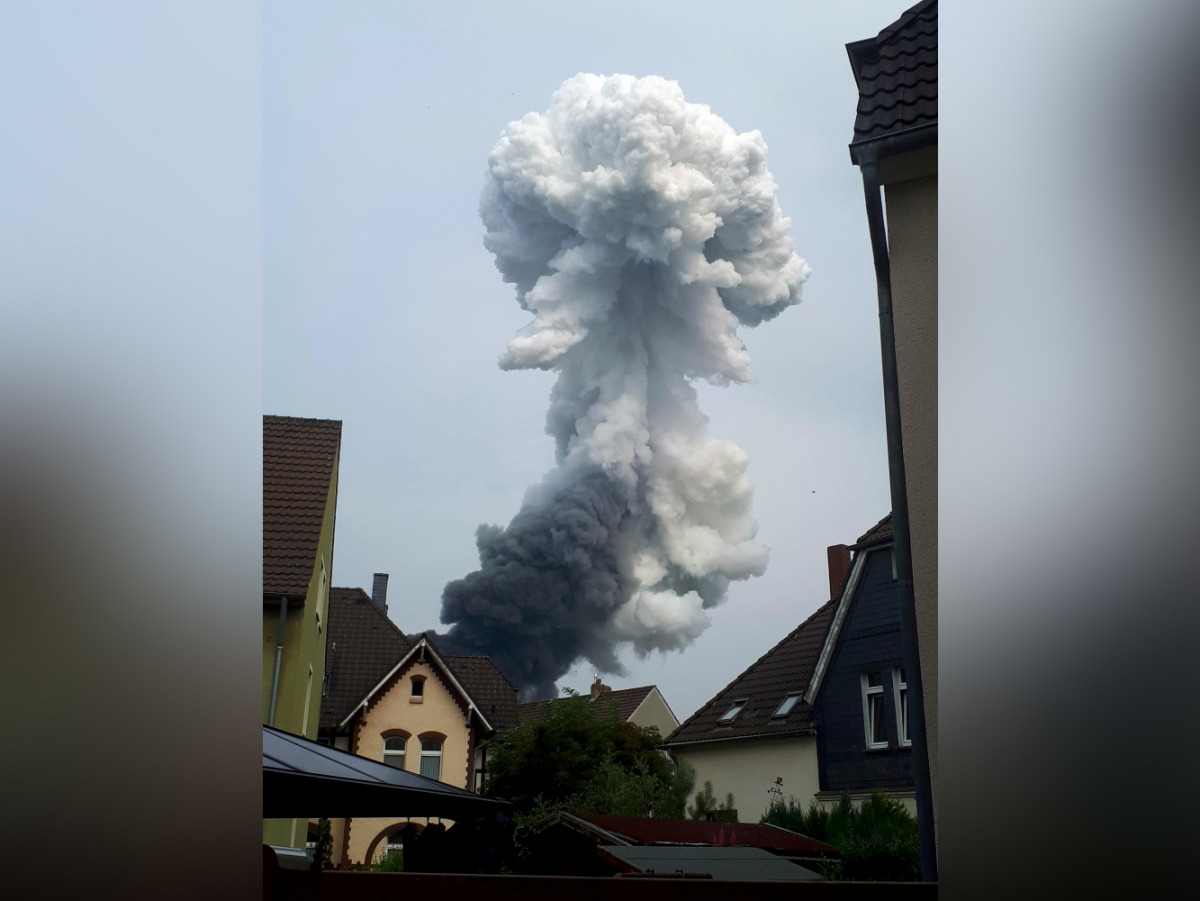 Smoke billows following an explosion in Wiesdorf, Leverkusen, Germany July 27, 2021, in this photo obtained from social media. Anna Fross/via Reuters 