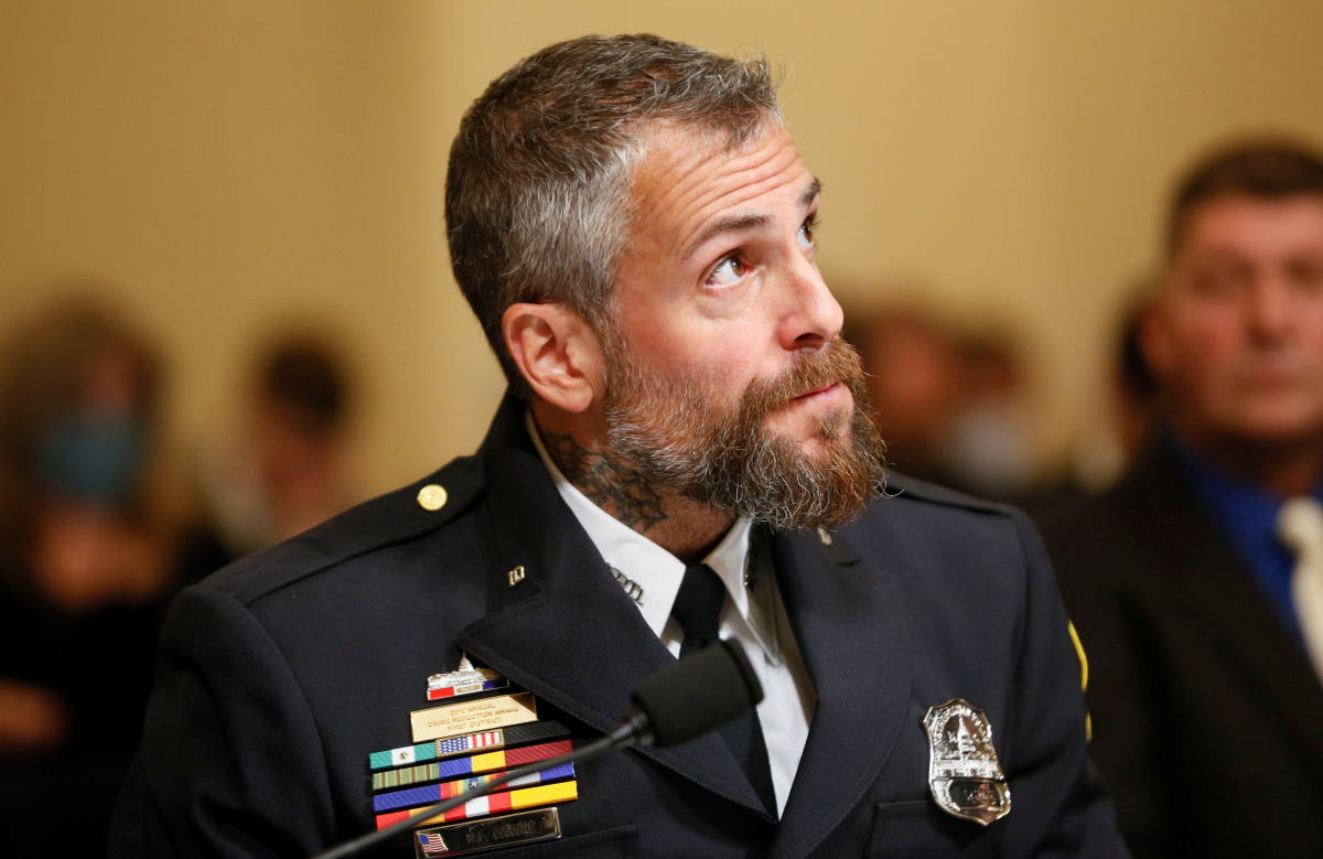 Metropolitan Police Officer Michael Fanone is seated to testify for the opening hearing of the U.S. House (Select) Committee investigating the January 6 attack on the U.S. Capitol, on Capitol Hill in Washington, U.S., July 27, 2021. REUTERS/Jim Bourg/Pool
