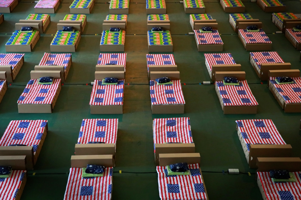 Beds are seen as the Thai government prepares to convert an air cargo warehouse into a coronavirus disease (COVID-19) field hospital at Don Mueang International Airport in Bangkok, Thailand July 28, 2021. REUTERS/Soe Zeya Tun