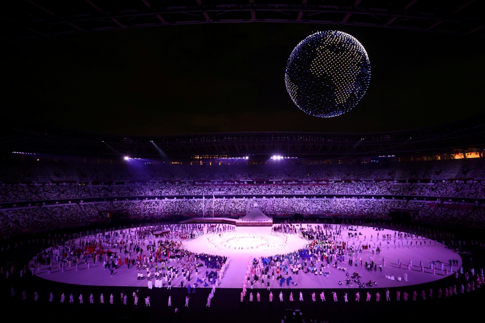 Drones are seen above the stadium during the opening ceremony REUTERS/Marko Djurica/File Photo