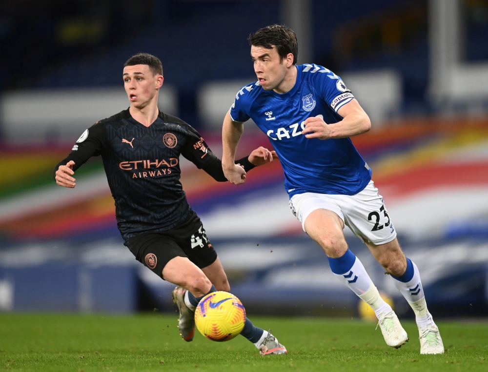 February 17, 2021 Everton's Seamus Coleman in action with Manchester City's Phil Foden Pool via REUTERS/Michael Regan