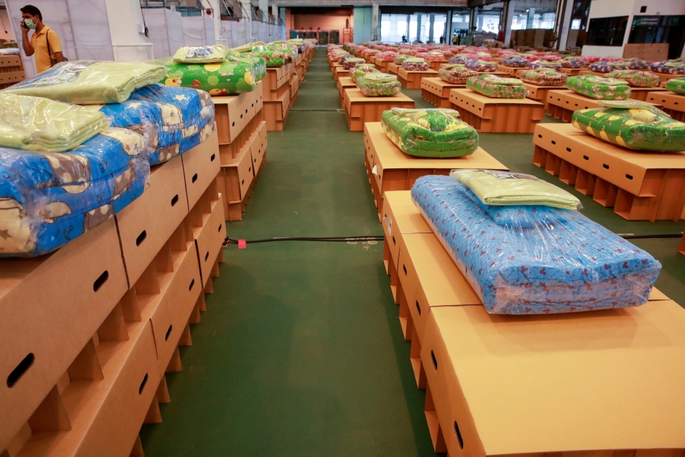 Beds are seen as the Thai government prepares to convert an air cargo warehouse into a coronavirus disease (COVID-19) field hospital at Don Mueang International Airport in Bangkok, Thailand July 28, 2021. REUTERS/Soe Zeya Tun/File Photo