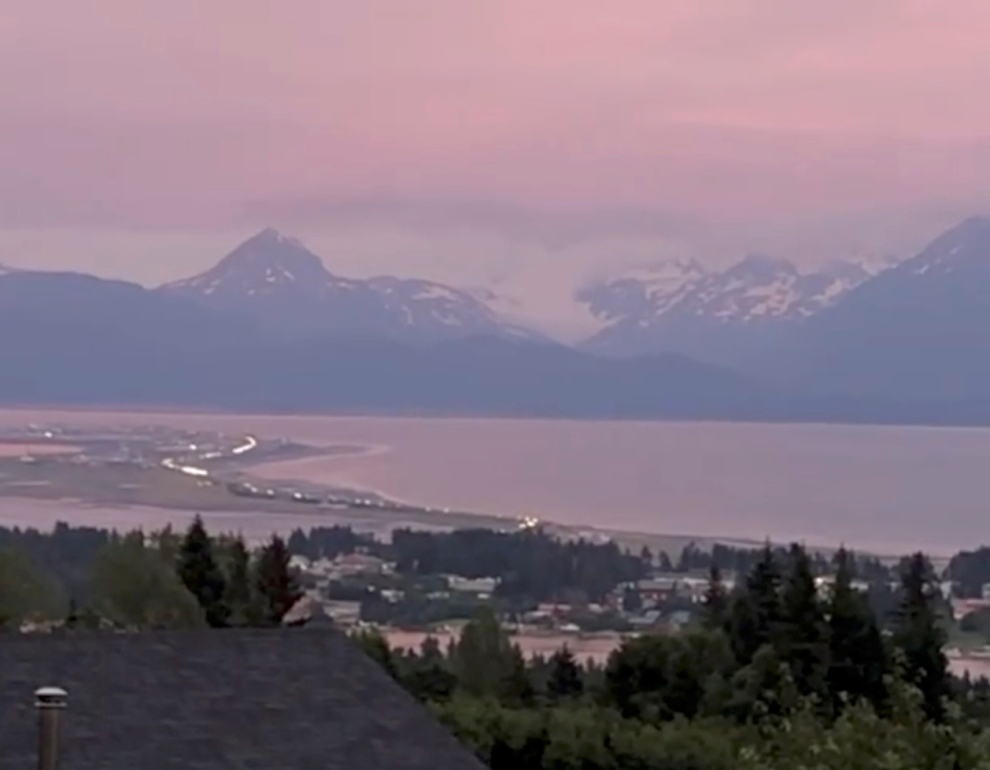 Vehicles evacuate Homer Spit following tsunami warning after a quake, in Homer, Alaska, U.S., July 28, 2021 in this still image obtained from a video on July 29, 2021. Brian Hudson/via REUTERS