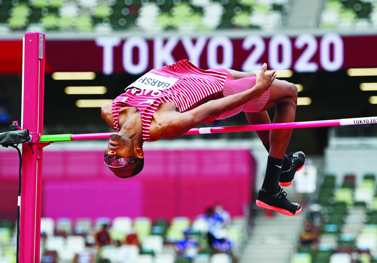 Mutaz Barshim of Qatar clears the 2.28 mark during the men's high jump qualification yesterday.