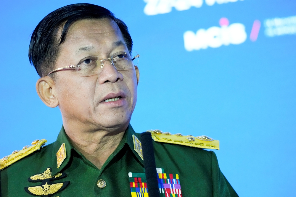 FILE PHOTO: Commander-in-Chief of Myanmar's armed forces, Senior General Min Aung Hlaing, delivers a speech at the IX Moscow conference on international security in Moscow, Russia, June 23, 2021. Alexander Zemlianichenko/Pool via REUTERS/File Photo