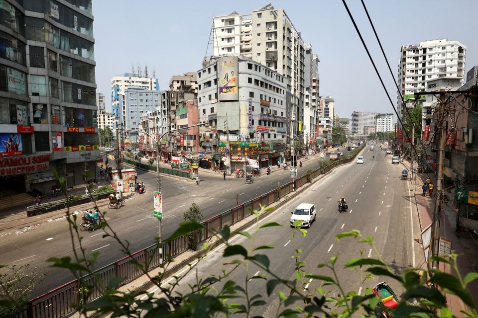 FILE PHOTO:Fewer vehicles are seen on the street as the government imposed restrictions on public movement after the number of coronavirus disease (COVID-19) cases increased in Dhaka, Bangladesh, April 14, 2021. REUTERS/Mohammad Ponir Hossain

