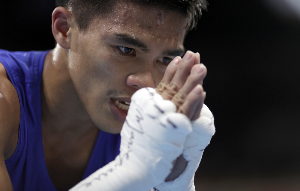 Carlo Paalam of the Philippines bows after his fight against Ryomei Tanaka of Japan REUTERS/Ueslei Marcelino