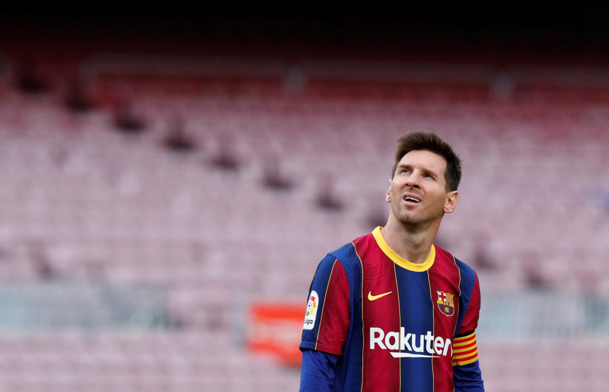 FILE PHOTO: Soccer Football - La Liga Santander - FC Barcelona v Celta Vigo - Camp Nou, Barcelona, Spain - May 16, 2021 Barcelona's Lionel Messi reacts REUTERS/Albert Gea/File Photo

