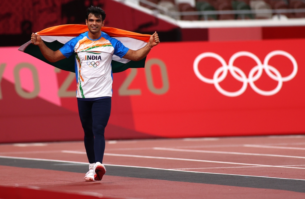 Neeraj Chopra of India celebrates after winning gold REUTERS/Andrew Boyers