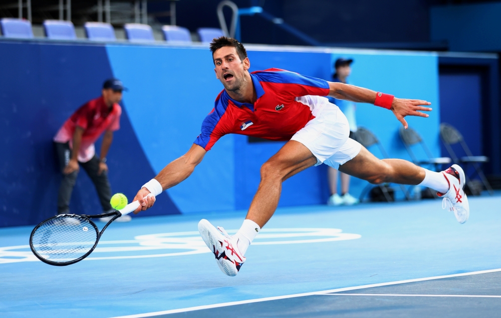 Novak Djokovic of Serbia in action during his bronze medal match against Pablo Carreno of Spain. Reuters File Photo