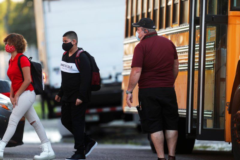 Students return on the first day of school amid the coronavirus (COVID-19) pandemic at West Tampa Elementary School in Tampa, Florida, U.S., August 10, 2021. REUTERS/Octavio Jones

