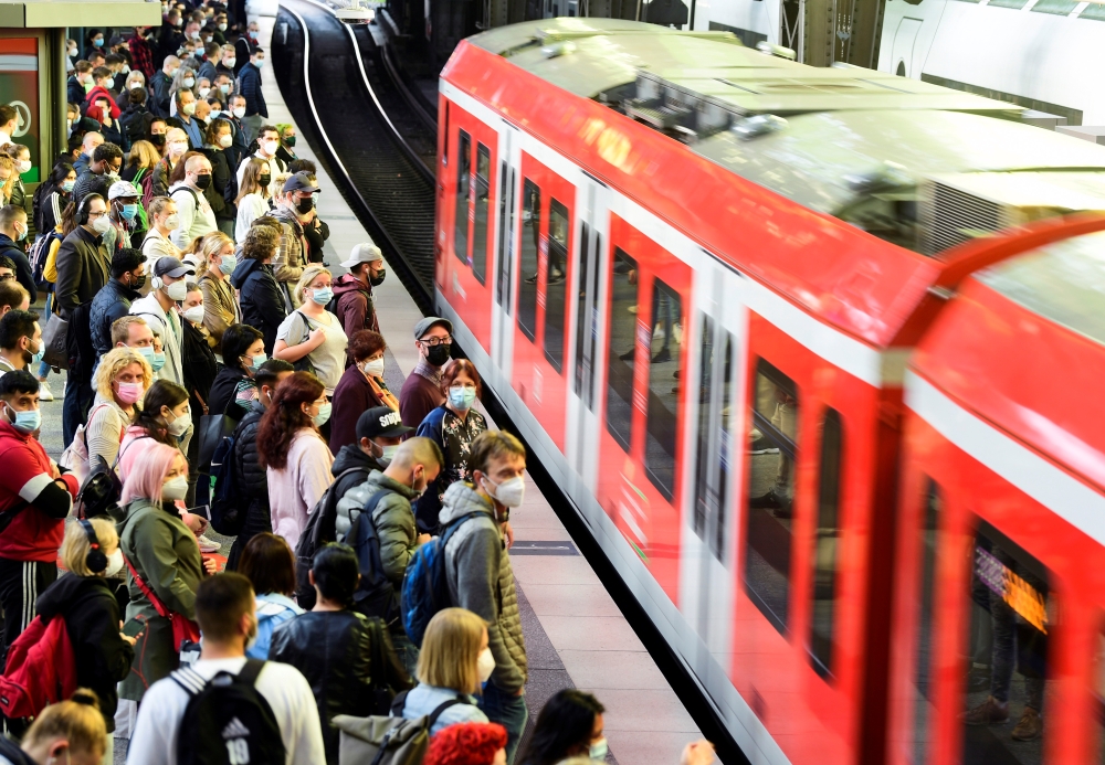 Passengers wait for a train during a railway drivers' strike of the German Train Drivers' Union (GDL) in Hamburg, Germany August 11, 2021. Reuters/Fabian Bimmer