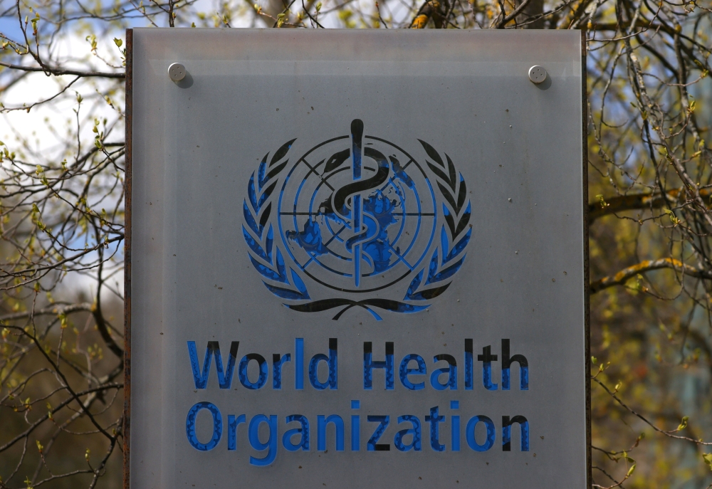 A logo is pictured outside a building of the World Health Organization (WHO) during an executive board meeting on update on the coronavirus disease (COVID-19) outbreak, in Geneva, Switzerland, April 6, 2021. REUTERS/Denis Balibouse/File Photo
