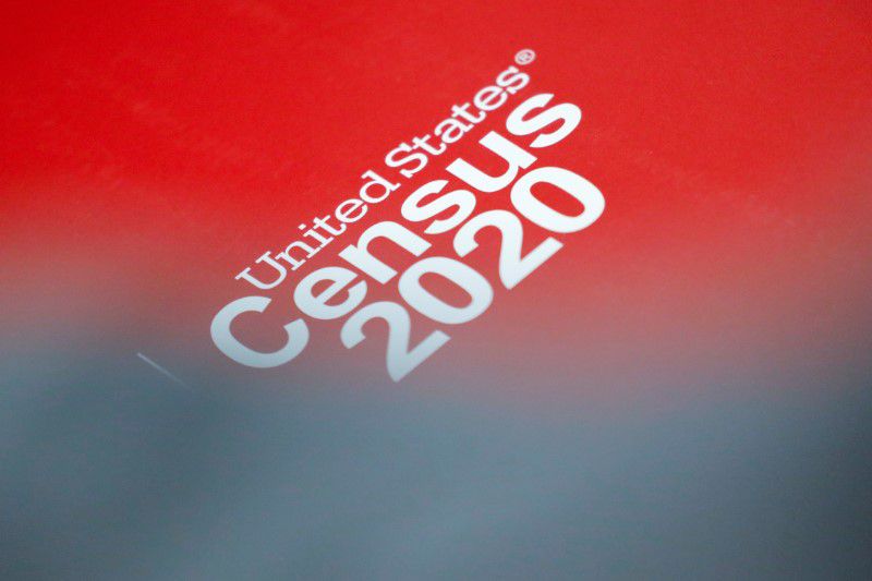 Census signage is seen at an event in Queens, New York City, U.S., February 22, 2020. REUTERS/Andrew Kelly/File Photo
