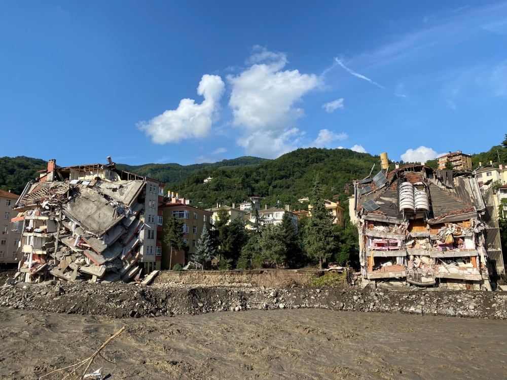 A view shows partially collapsed buildings, as the area was hit by flash floods that swept through towns in the Turkish Black Sea region, in the town of Bozkurt, in Kastamonu province, Turkey, August 14, 2021. REUTERS/Bulent Usta
