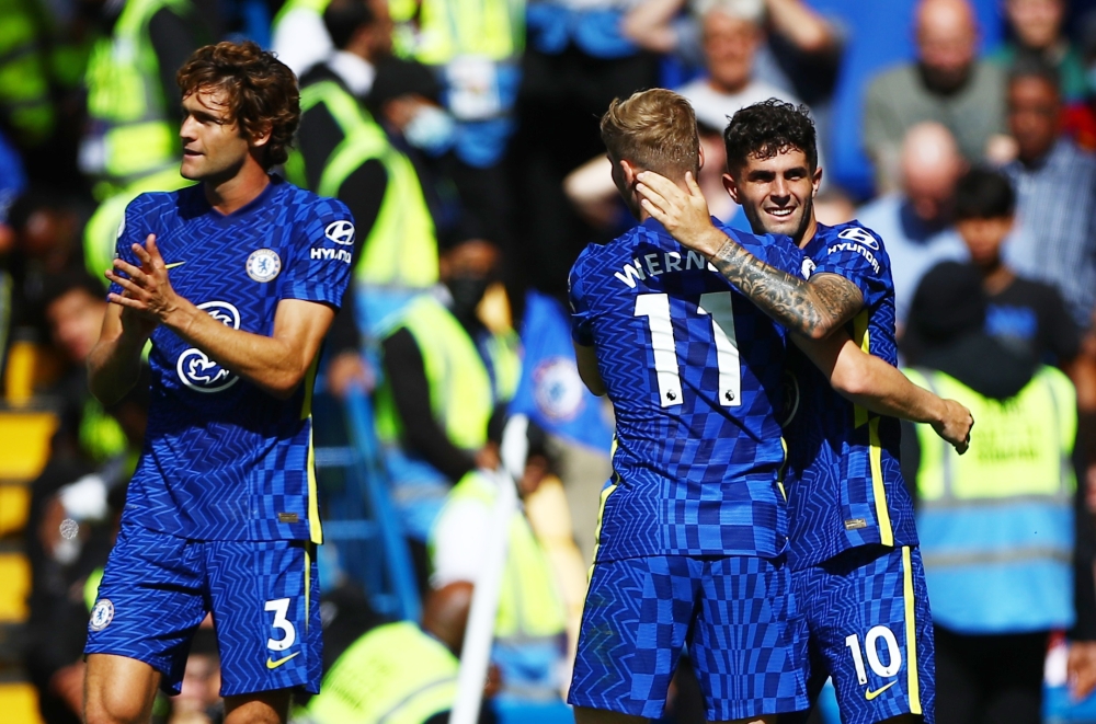 Chelsea's Christian Pulisic celebrates scoring their second goal with Timo Werner and Marcos Alonso REUTERS/Hannah Mckay 
