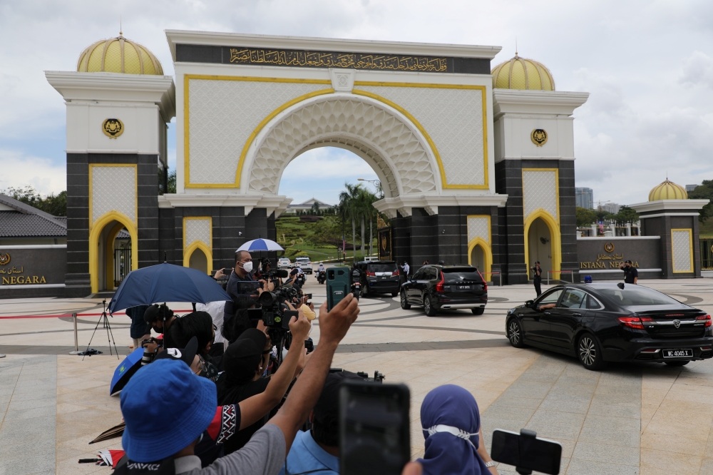 A convoy with Malaysian Prime Minister Muhyiddin Yassin arrives at the National Palace for his meeting with the king, in Kuala Lumpur, Malaysia August 16, 2021. Reuters/Lim Huey Teng