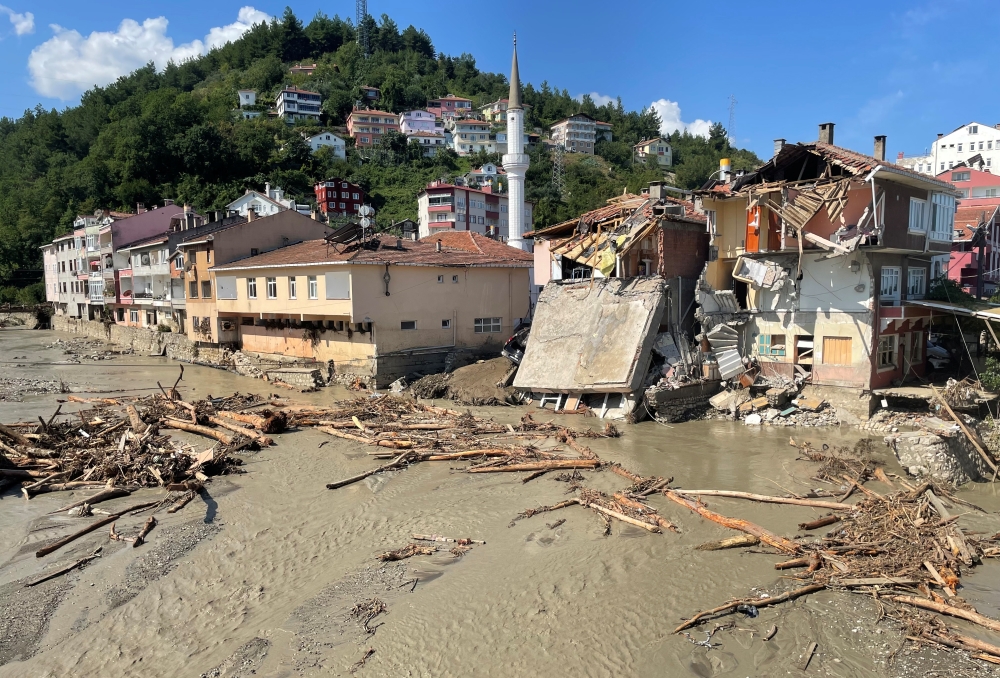 A view shows partially collapsed buildings, as the area was hit by flash floods that swept through towns in the Turkish Black Sea region, in the town of Ilisi, in Kastamonu province, Turkey, August 15, 2021. REUTERS/Mehmet Emin Caliskan