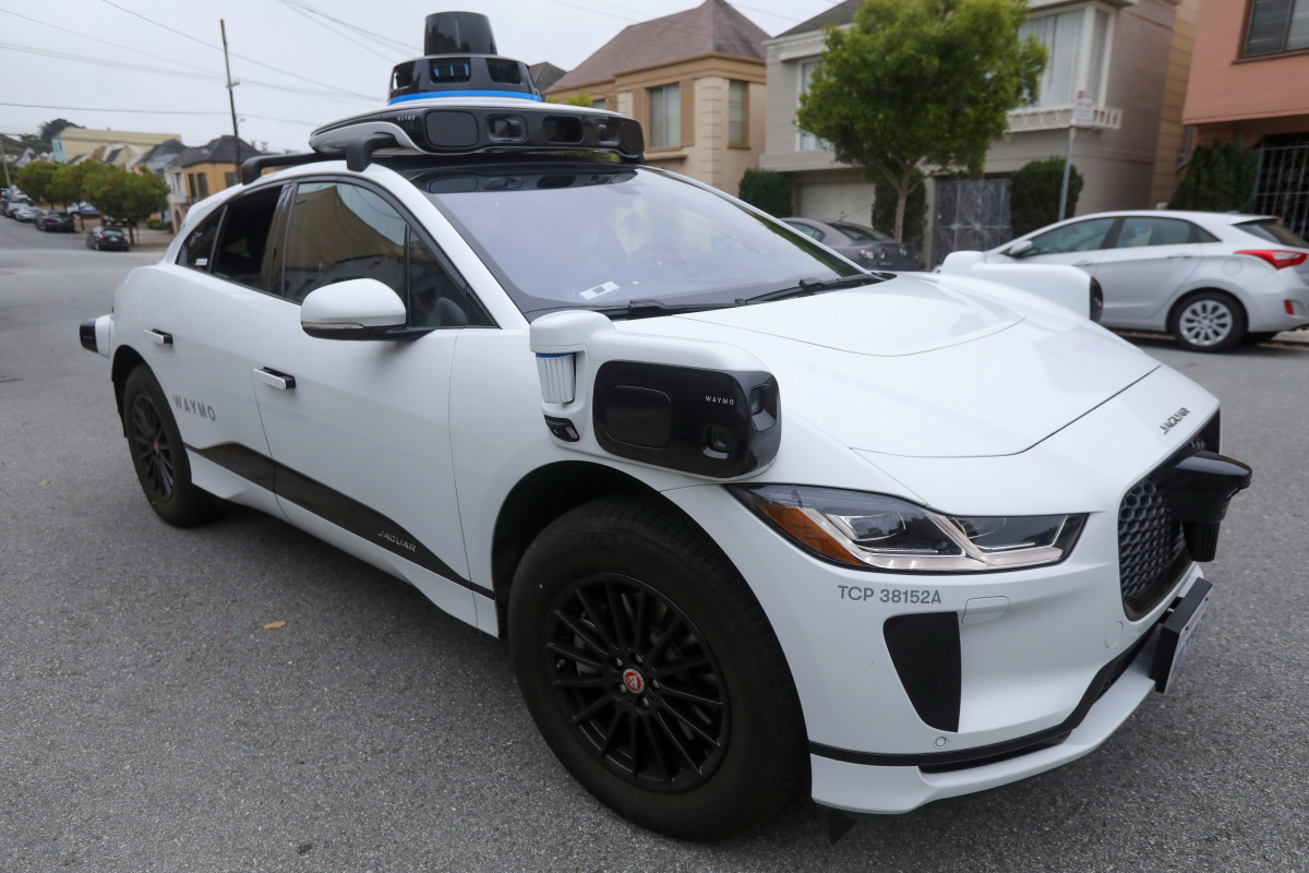 A Waymo Jaguar I-Pace SUV is seen driving on a road in San Francisco, California, U.S. on August 20, 2021. Picture taken August 20, 2021. REUTERS/Nathan Frandino
