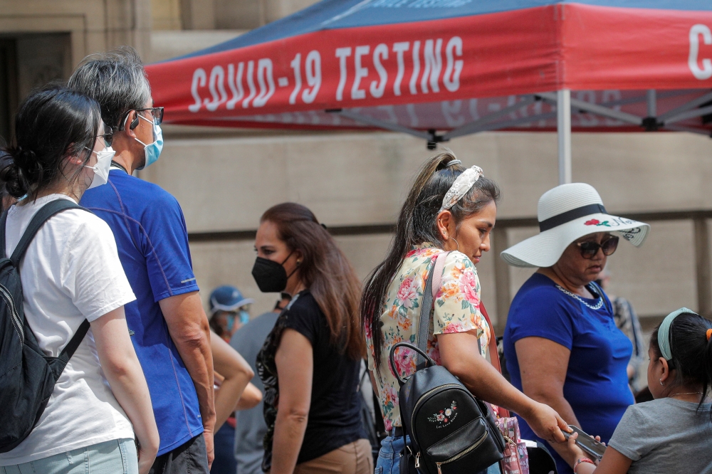 People line up at a coronavirus disease (COVID-19) testing at a mobile testing van in New York City, U.S., August 27, 2021. REUTERS/Brendan McDermid