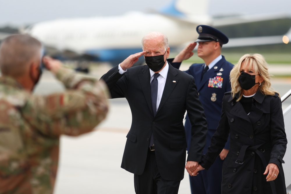U.S. President Joe Biden and first lady Jill Biden arrive at Dover Air Force Base in Dover, Delaware, U.S., August 29, 2021. REUTERS/Tom Brenner