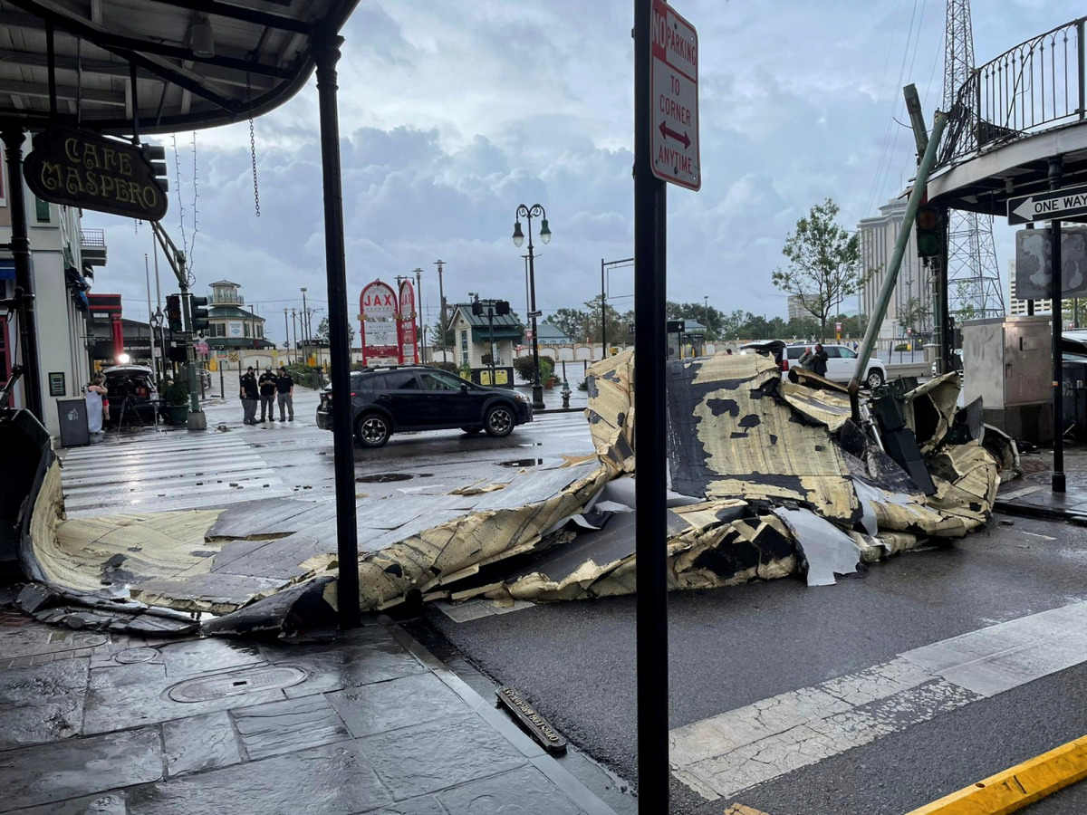 The roof of a building next to Jax Brewery lies on the ground after it was blown off due to strong winds from Hurricane Ida in New Orleans, Louisiana, U.S., August 30, 2021. REUTERS/Devika Krishna Kumar
