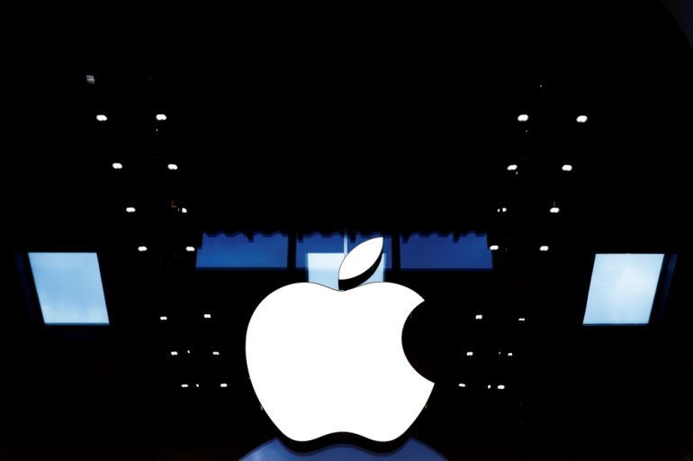 Apple logo is seen on the Apple store at The Marche Saint Germain in Paris, France July 15, 2020. REUTERS/Gonzalo Fuentes
