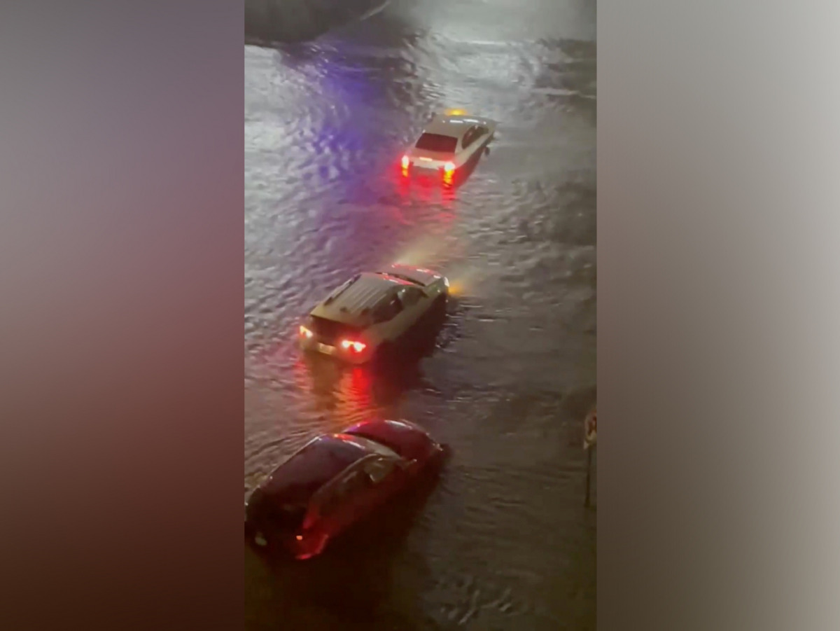 Vehicles are stranded on a flooded road in Yonkers in New York, U.S. September 1, 2021, in this still image taken from video obtained from social media. TRI-STATE WEATHER/via REUTERS 
