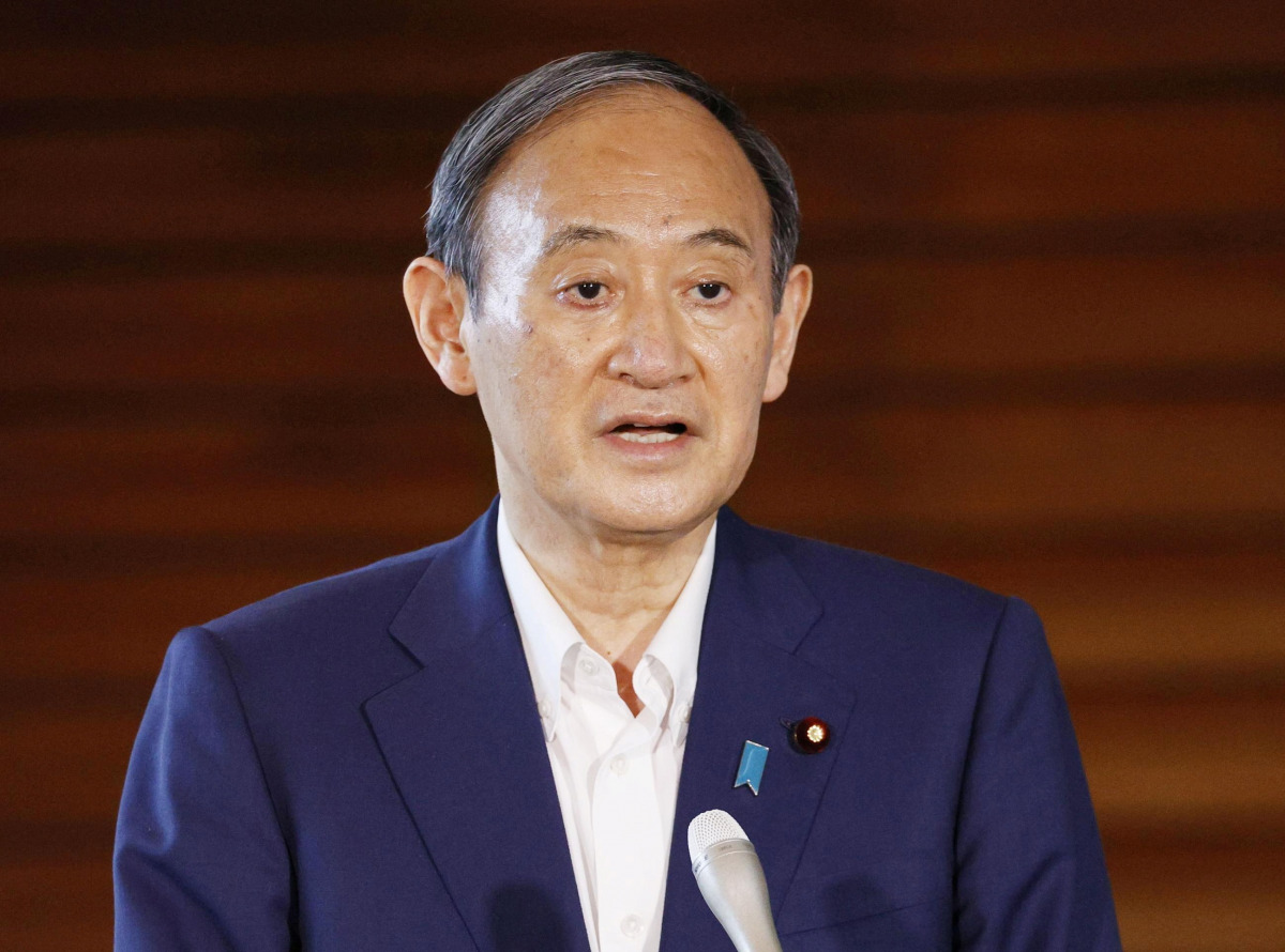 Japan's Prime Minister Yoshihide Suga speaks to media after he annouced to pull out of a party leadership race at his official residence in Tokyo, Japan, September 3, 2021. Kyodo/via REUTERS 