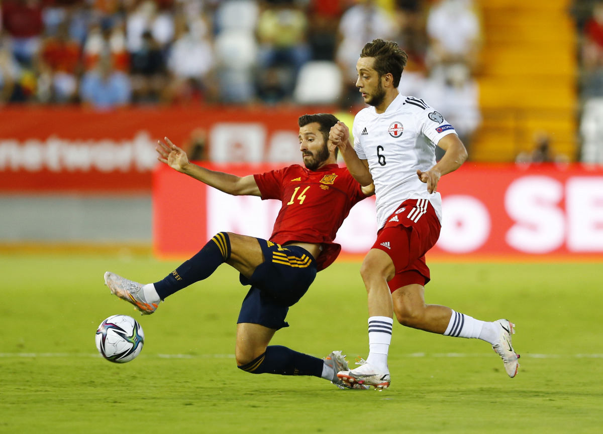Soccer Football - World Cup - UEFA Qualifiers - Group B - Spain v Georgia - Estadio Nuevo Vivero, Badajoz, September 5, 2021 Spain's Jose Gaya in action with Georgia's Giorgi Zaria REUTERS/Marcelo Del Pozo

