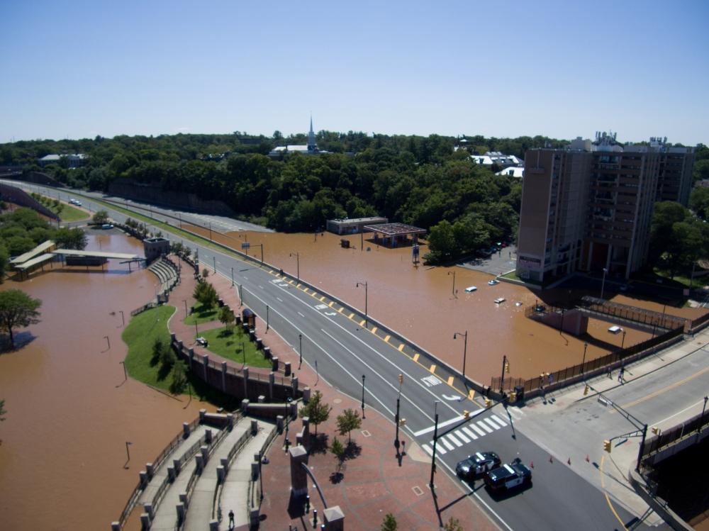 FILE PHOTO: Roads are covered in floodwaters caused by the remnants of Tropical Storm Ida which brought drenching rain, flash floods and tornadoes to parts of the northeast in New Brunswick, New Jersey, U.S., September 2, 2021. Picture taken with a drone.