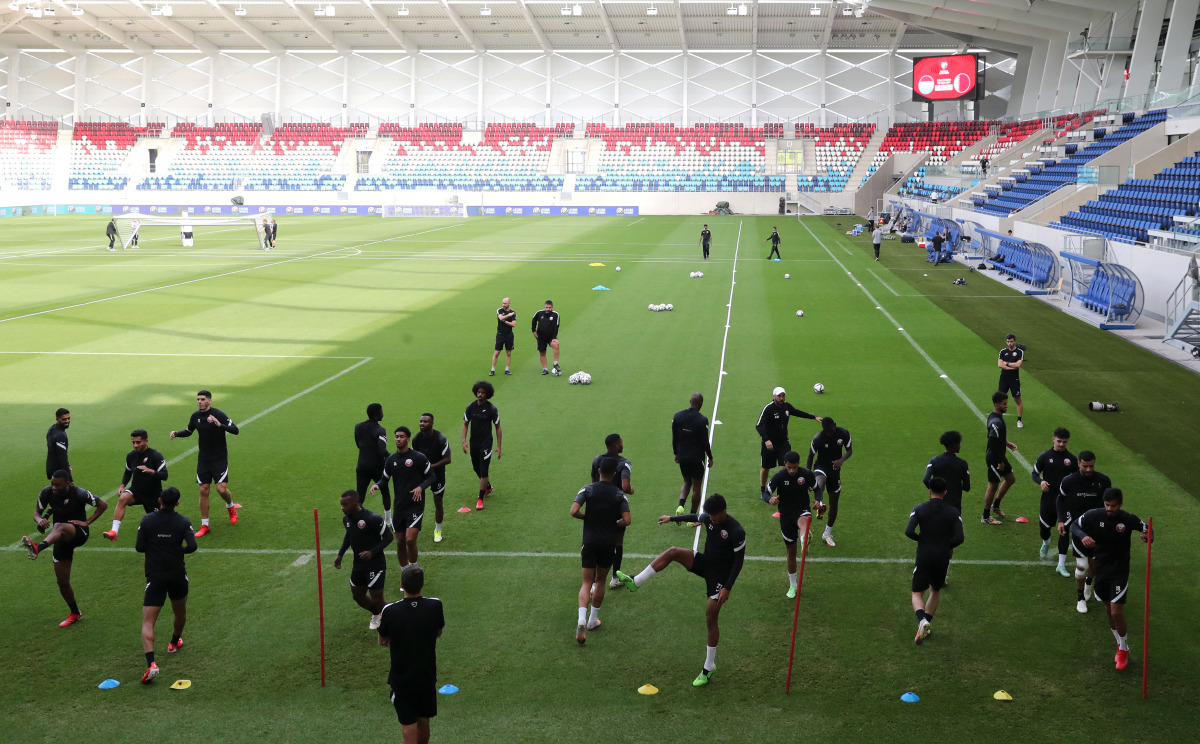 Qatar players in action during a practice session at the Stade de Luxembourg yesterday.
