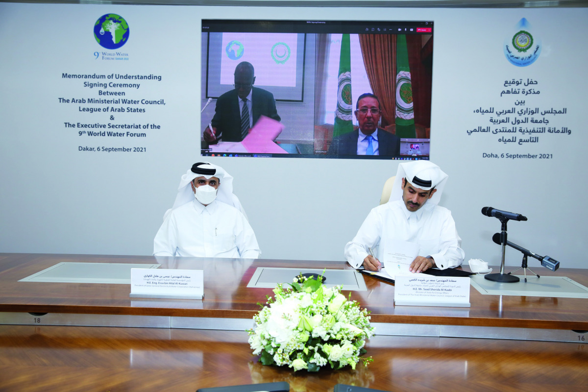 H E Saad Sherida Al Kaabi, Minister of State for Energy Affairs, in his capacity as the current President of the Arab Ministerial Water Council, signing the MoU.