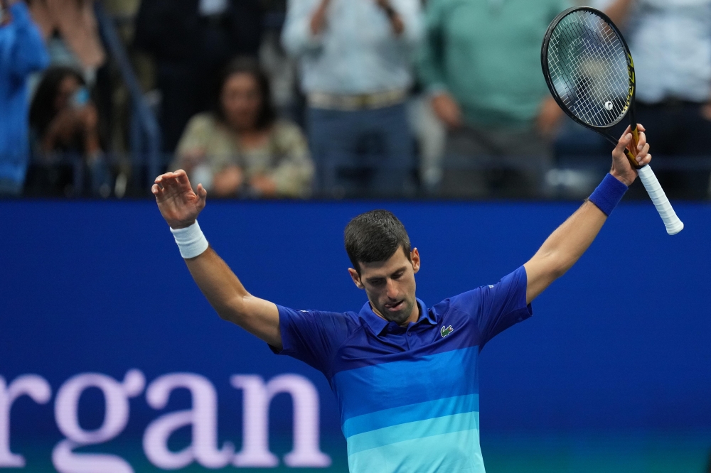 Novak Djokovic of Serbia celebrates after match point against Alexander Zverev of Germany (not pictured) at USTA Billie Jean King National Tennis Center. Danielle Parhizkaran-USA TODAY Sports