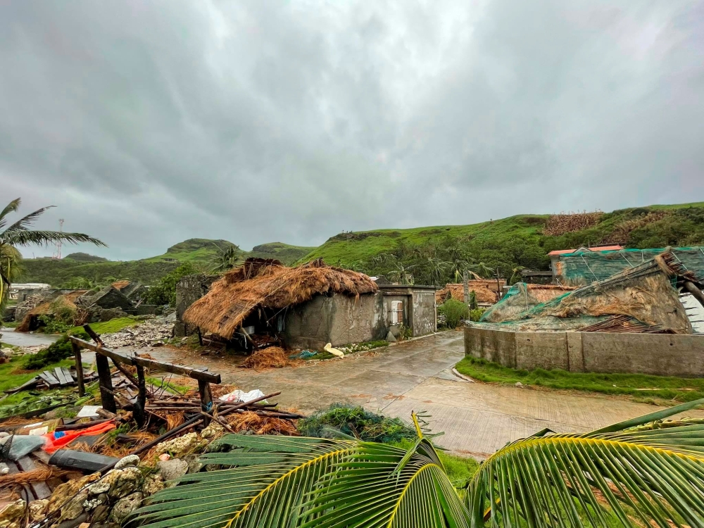 Damaged buildings and debris are seen after Typhoon Chanthu passed through Sabtang, Batanes, Philippines, in this September 12, 2021 image obtained via social media. Dennis Ballesteros Valdez via Reuters 