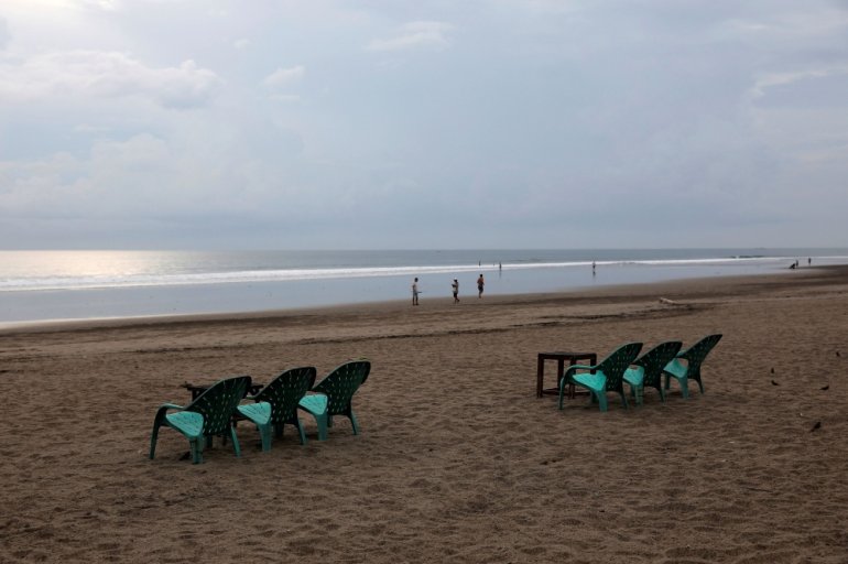 FILE PHOTO: Empty chairs are seen at Seminyak beach amid the spread of coronavirus disease (COVID-19) in Bali, Indonesia, March 23, 2020. REUTERS/Nyimas Laula/File Photo
